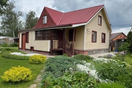 Дом на участке 16 сот.